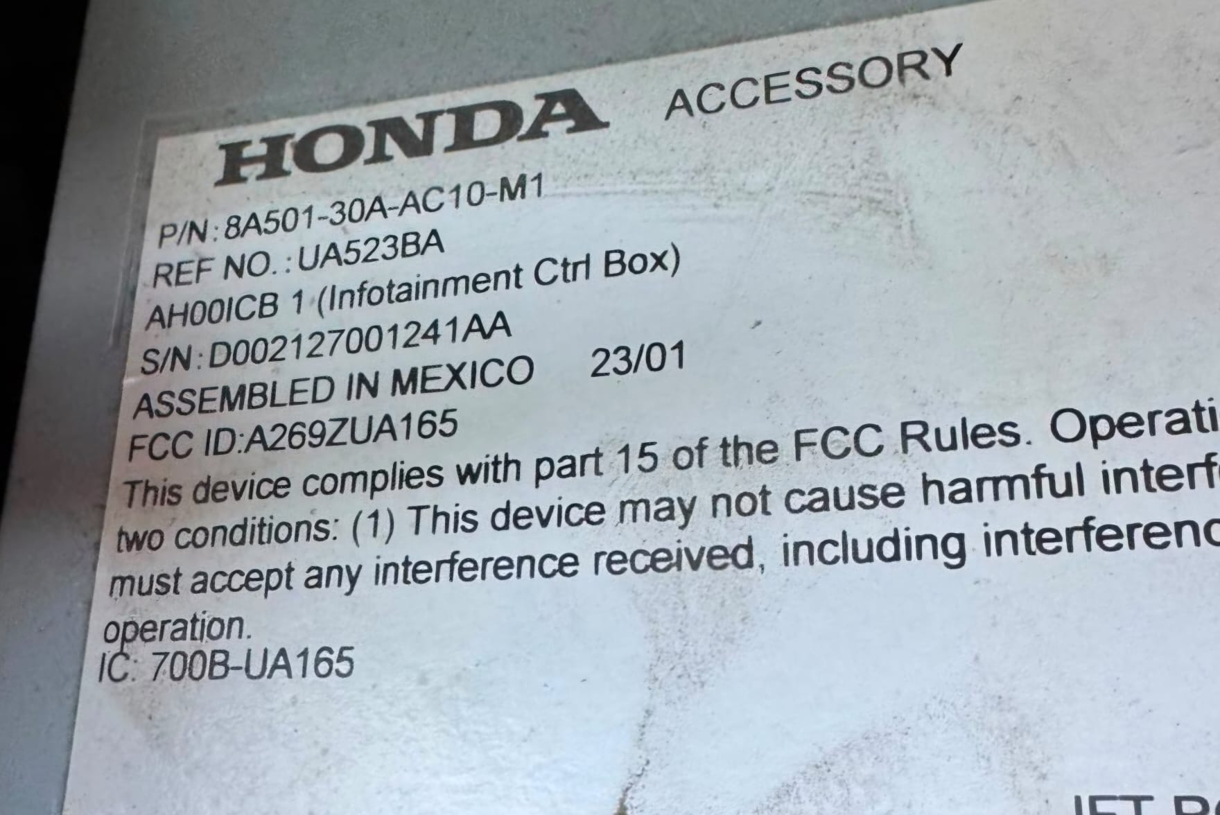 Honda Alpine radio label with the D002127001241AA serial number used for the radio code